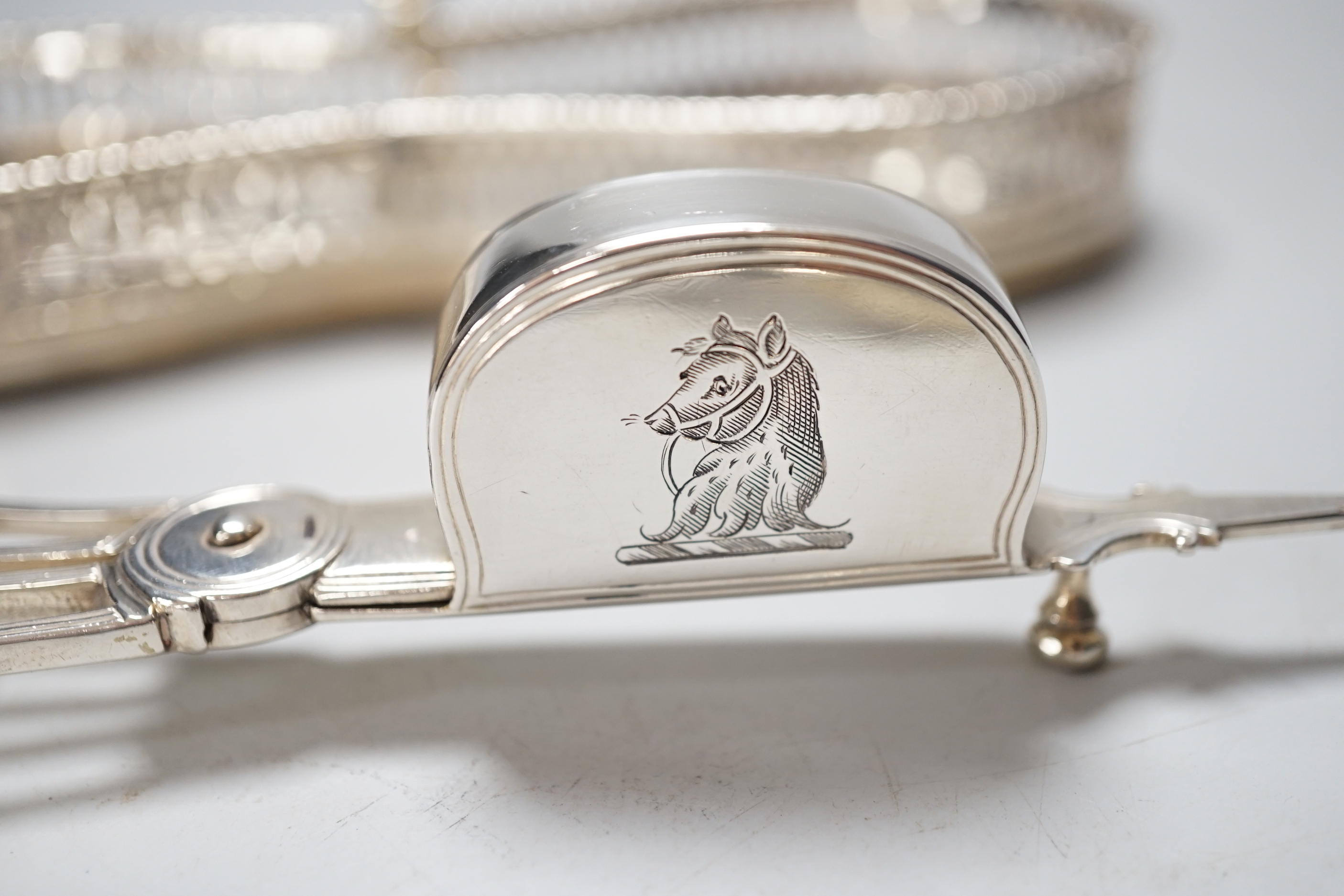 A pair of George III silver snuffers, maker William Bateman, London 1813, a George II sifter ladle and a snuffer's stand with wooden base, gross 328 grams